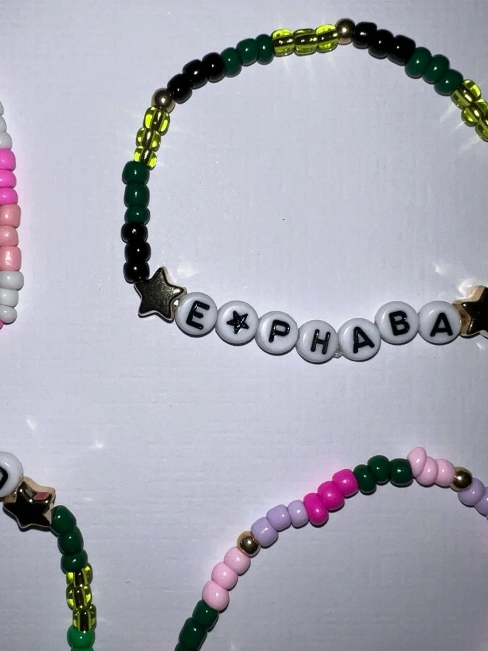 4 Wicked beaded bracelets.